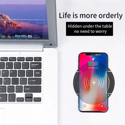 Under-Desk Charger for Daily Home and Office Workstations showing phone wirelessly charging under desk to keep workspace tidy