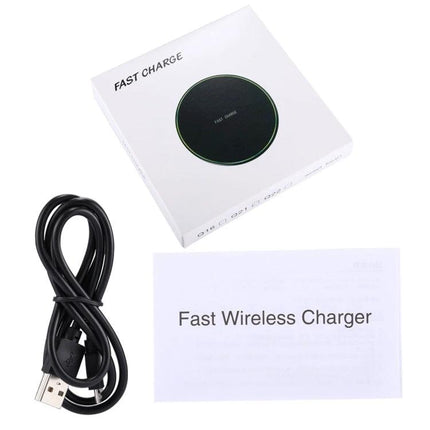 Compact Q21 Charger for Daily Home and Travel Use showing white fast wireless charging pad, USB cable and instruction leaflet