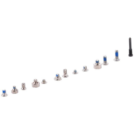 Set of Screws and Bolts for Everyday iPhone X Repairs - assorted silver and white charging port screws and bolts laid out for at-home iPhone X repair