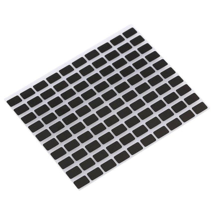 Essential screen welding stickers for home device repairs daily - sheet of small black repair stickers for smartphone screen cracks