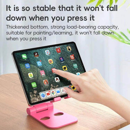 Foldable Ergonomic Phone Holder for Hands-Free Viewing on desk holding tablet at comfortable tilt with anti-skid base and hand tapping screen