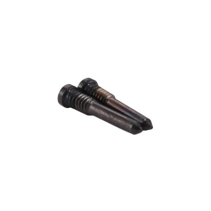 Replacement Screws for iPhone X Charging Port Home Repairs - close-up of two black replacement screws for charging port repair