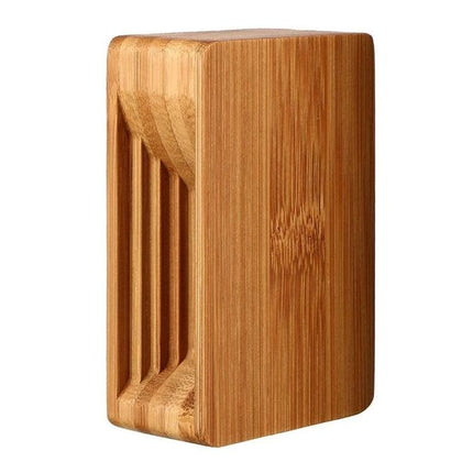 Natural Bamboo Universal Desktop Phone Stand for Smartphones holding a smartphone upright on a desk, eco-friendly bamboo finish
