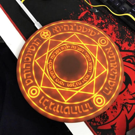 Wireless Charger for Daily Home and Travel Essentials glowing rune-style portable wireless charging pad on desk