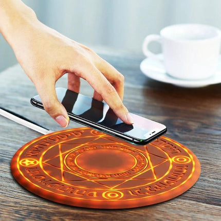 Wireless Charger for Daily Home and Travel Essentials - compact portable wireless charging pad on a wooden desk with smartphone and coffee cup