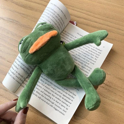 Protect your earbuds daily with a plush frog case on the go soft plush frog AirPods case protecting from drops with charging port access