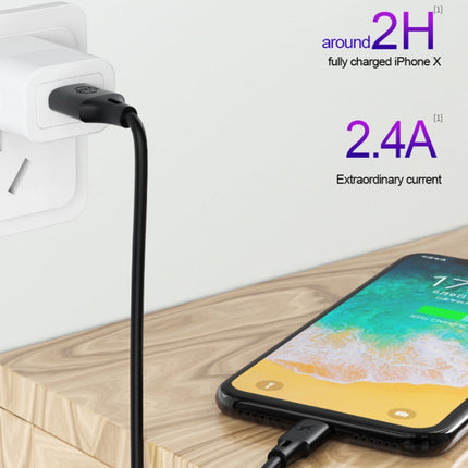 Essential USB Cable for Daily Device Charging at Home - 8‑pin cable plugged into wall charger powering phone on wooden desk, extra length for couch or desk use