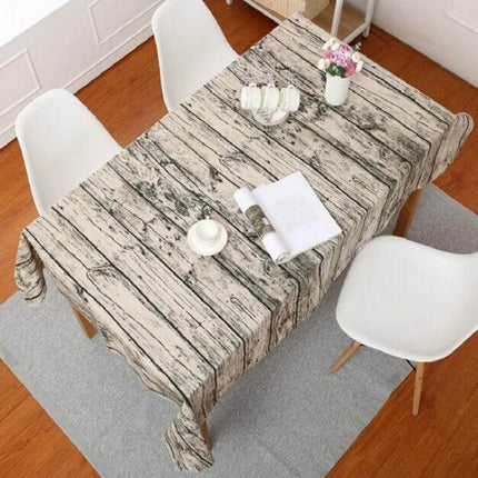 Imitation Bark Cotton Linen Tablecloth Dyed Stripes on dining table with white chairs, rustic wood-look striped pattern, two size options