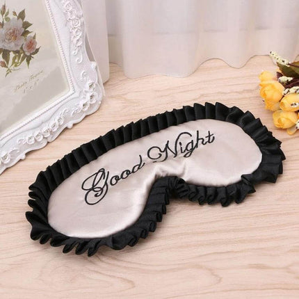 Imitation Silk Sleep Mask For Travel And Home Use Soft And Breathable beige satin eye mask with black ruffle trim embroidered "Good Night"