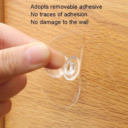 Invisible Cabinet Drawer Handle 2 Pack With Self Adhesive Suction Cups - clear removable suction cup on wooden drawer showing adhesive, invisible acrylic handle