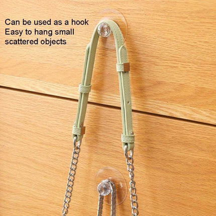 Invisible Cabinet Drawer Handle 2 Pack With Self Adhesive Suction Cups - clear acrylic invisible suction cup handle on wooden drawer used as a hook for bag