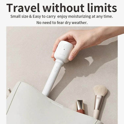 JisuLife Wireless High Mist Portable Humidifier White No Water Tank shown compactly packed in a handbag for travel and desk use