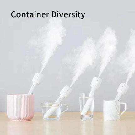 JisuLife Wireless High Mist Portable Humidifier White No Water Tank shown emitting nano-fine mist from four containers for travel and desk use
