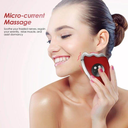 K-SKIN Facial Massager Red For Home Skincare Routine - red microcurrent vibrator with rounded three-point head used on cheek for improved circulation and serum absorption