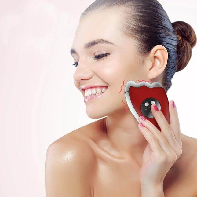 K-SKIN Facial Massager Red For Home Skincare Routine compact red device used on cheek to boost circulation and serum absorption