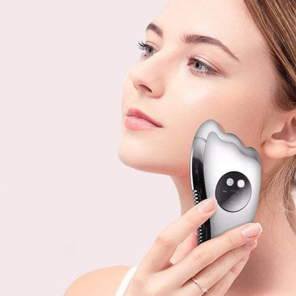 K-SKIN Facial Massager Red For Home Skincare Routine used on jawline to boost circulation and serum absorption
