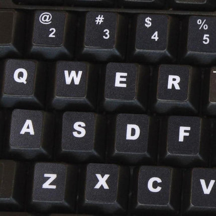 English Keyboard Stickers with White Letters for Laptops and Notebooks showing black keys with white Q W E R A S D F Z X C V letters
