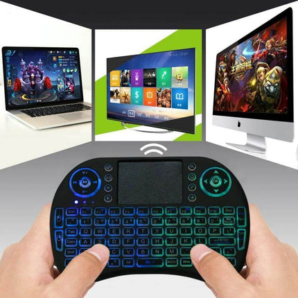 Wireless Mini QWERTY Keyboard with Touchpad for Smart Devices compact wireless keyboard with backlit keys and touchpad controlling TV laptop and desktop