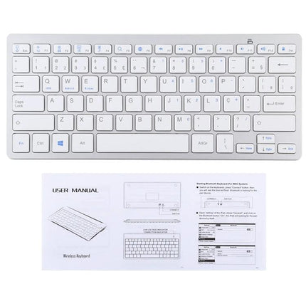 Wireless Bluetooth Keyboard with Portuguese Layout slim white keyboard shown with user manual, Bluetooth keys and compact Portuguese layout