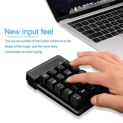 MC Saite Wireless 19-Key Numeric Keyboard for Everyday Computing - compact black USB numeric keypad shown with hand typing next to laptop