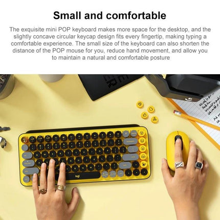 Logitech POP Keys Round Button Bluetooth Mechanical Keyboard shown in yellow with round keycaps and matching mouse on desk