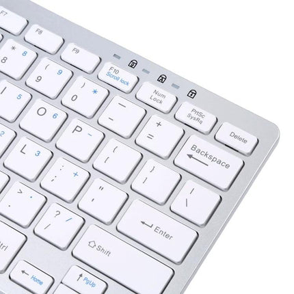 Compact 78-Key Ultra-Thin Wired Keyboard for Everyday Use showing white low-profile keys, aluminum alloy frame and USB wired connection