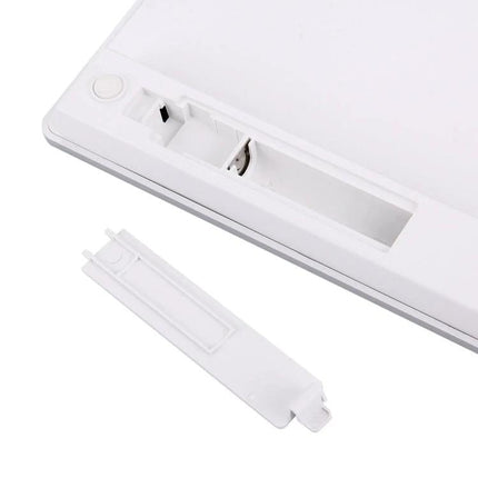 Wireless Bluetooth Keyboard for Computers and Tablets white keyboard battery compartment and removable stand close-up