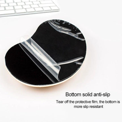 MONTIAN Heart-Shaped Silicone Wrist Supporter for Mouse Use, 2 Pack placed beside keyboard showing anti-slip bottom and protective film