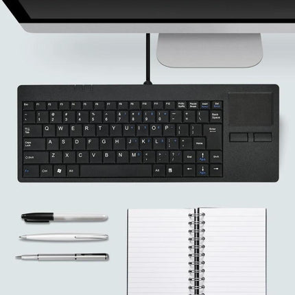 Ultra-Thin 82-Key Wired Keyboard with Touch Pad for Computers shown on desk with monitor, pens and notebook