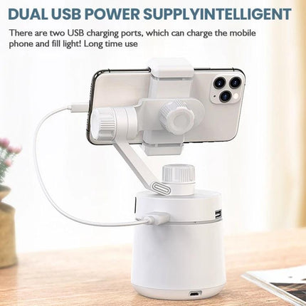 Compact Tripod for Daily Home Video Calls and Outings showing white phone mount with dual USB charging ports and face-tracking on a desk
