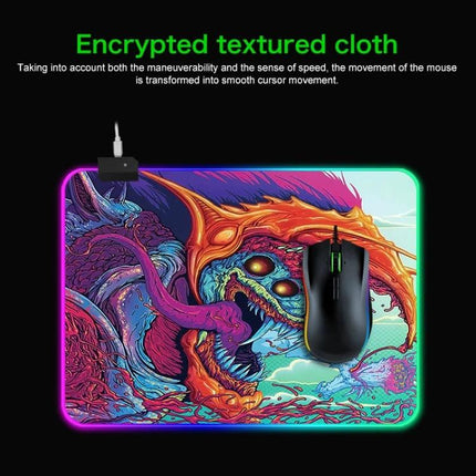 Illuminated Mouse Pad with Computer Monster Pattern for Gaming, RGB edge, textured cloth, gaming mouse on vibrant monster artwork