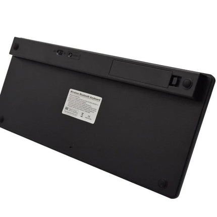Slim Ultrathin Wireless Keyboard for Portable Daily Typing – slim black Bluetooth keyboard backside with battery cover and power switch