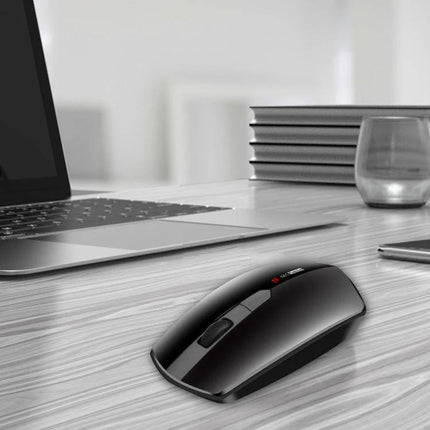 MCSaite USB-C Wireless Optical Mouse for Everyday Computing on desk beside laptop, sleek black wireless mouse for Windows Android Mac