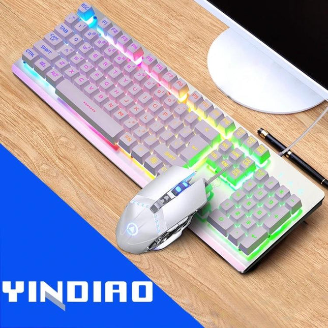 YINDIAO Wired RGB Backlight Keyboard and Mouse Set showing white RGB keyboard and ergonomic gaming mouse on wood desk