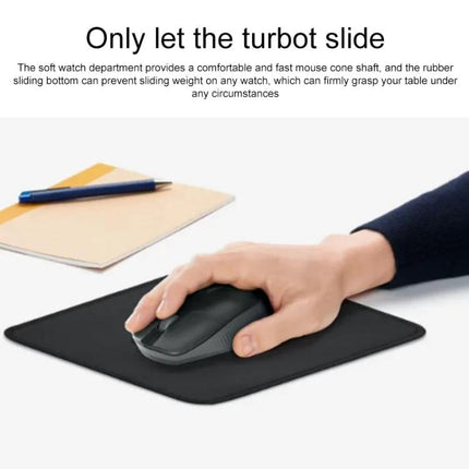 Logitech Soft Surface Mouse Mat for Comfortable Daily Use - black soft-surface mouse mat with hand using wireless mouse on desk