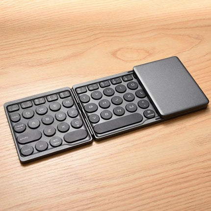Rechargeable Wireless Bluetooth Keyboard with Touchpad for Devices slim foldable design on wooden desk with touchpad