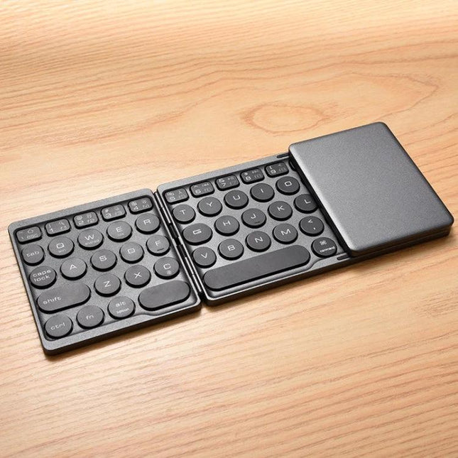 Rechargeable Wireless Bluetooth Keyboard with Touchpad for Devices slim foldable design on wooden desk with touchpad