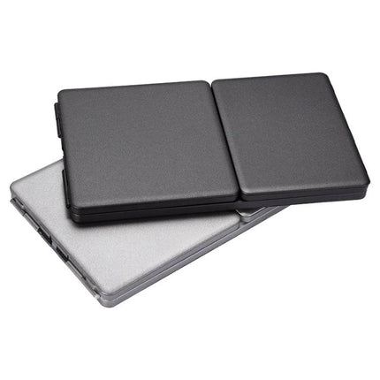 Rechargeable Wireless Bluetooth Keyboard with Touchpad for Devices compact foldable design in black and silver for tablets and phones