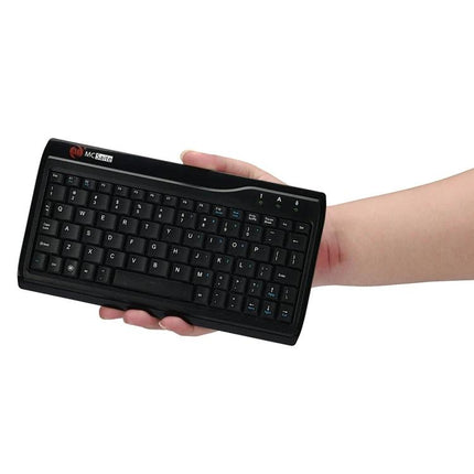 MC Saite 78-Key Wired Mini Keyboard for Everyday Computing compact black wired mini keyboard held in hand for small desks and portable workspaces