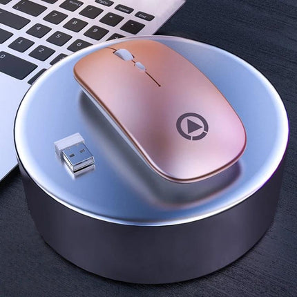 YINDIAO Wireless Silent Mouse for Quiet Everyday Computing rose gold silent wireless mouse with USB dongle on desk near laptop