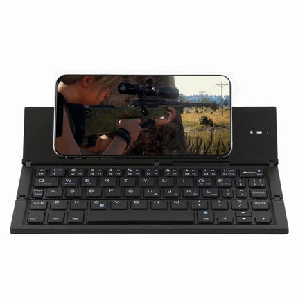 GK608 Ultra-Thin Foldable Bluetooth Keyboard with Built-in Holder showing smartphone in built-in stand for portable typing and gaming