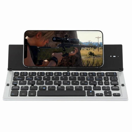 GK608 Ultra-Thin Foldable Bluetooth Keyboard with Built-in Holder shown open with smartphone in built-in stand for portable gaming and typing