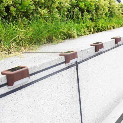 Solar Staircase Light For Outdoors Warm White Stairs Garden brown solar LED step lights on concrete retaining wall