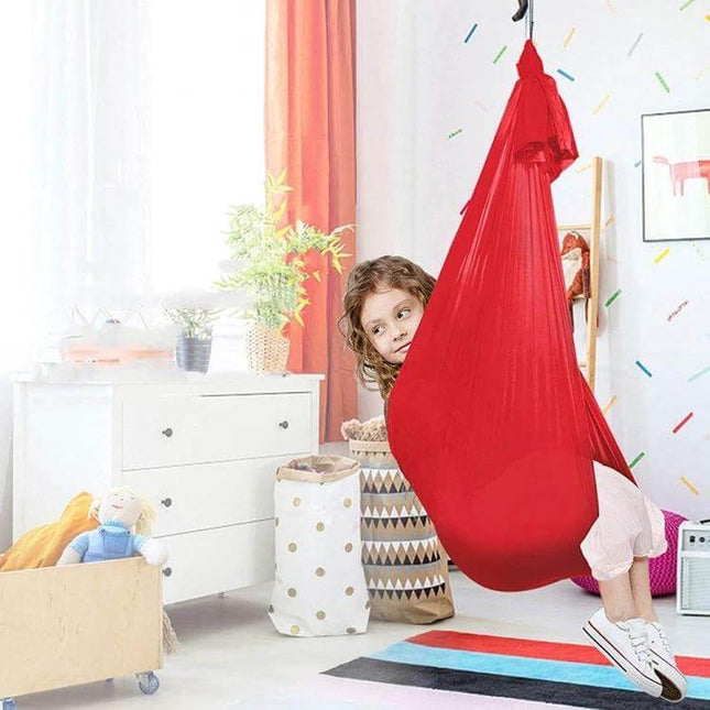 Kids Elastic Hammock Swing 100x280 cm in red nylon indoor playroom with child relaxing and supervised swinging support up to 100 kg