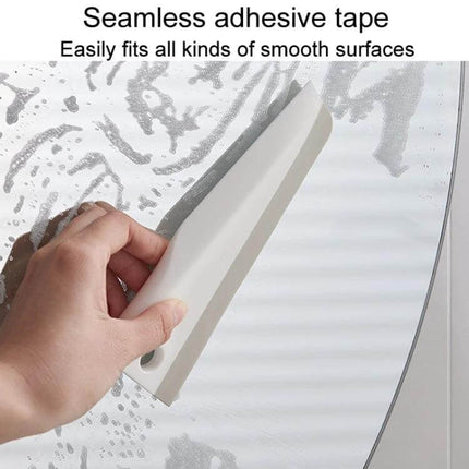 Kitchen Bathroom Countertop Scraper Dual Sided Cleaning being used to remove water and residue from a smooth mirror surface without scratching
