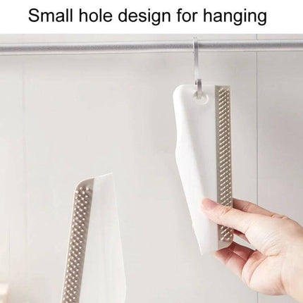 Kitchen Bathroom Countertop Scraper Dual Sided Cleaning hanging by small hole, hand holding scraper showing ergonomic curved design