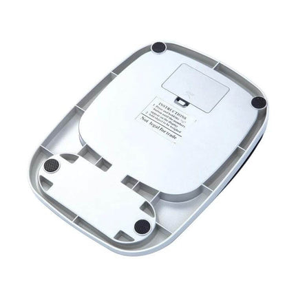 Alt Tag: Kitchen Scale For Precise Measuring, Stainless Steel, 3kg Capacity - underside view showing 304 stainless platform, anti-slip feet and battery compartment