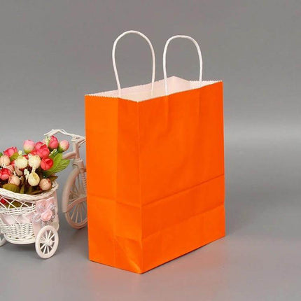 Kraft Paper Gift Bags With Handles, Assorted Sizes - orange kraft paper gift bag with white handles for gifts, favors, and small business packaging