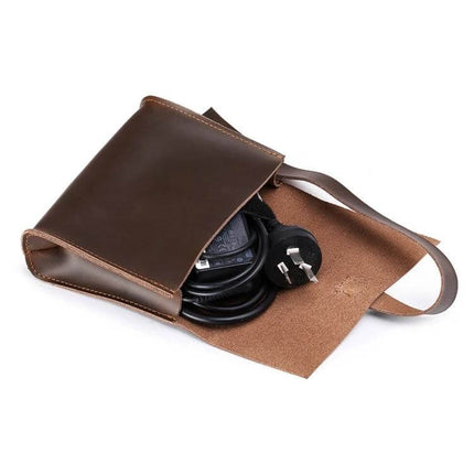 Genuine Leather Protective Sleeve for 15.4 Inch Laptops and Below in brown leather holding chargers and cables