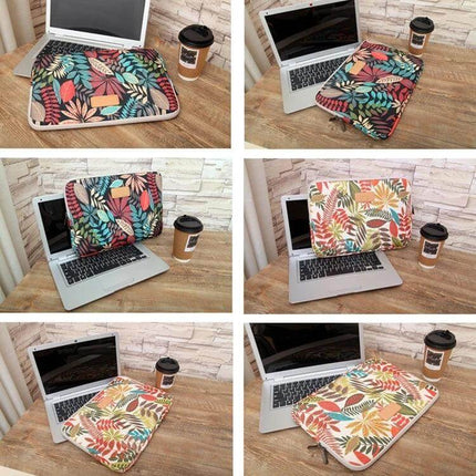 Lisen 13-Inch Laptop Sleeve with Colorful Leaves Design shown on wooden desk with laptop and coffee cup